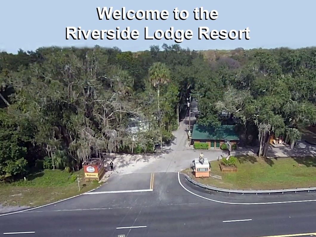 an aerial view of the riverside lodge resort