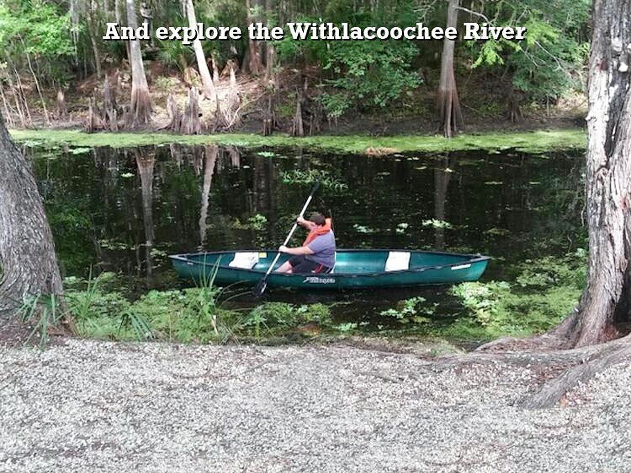 a man in a canoe on a river with the words 
