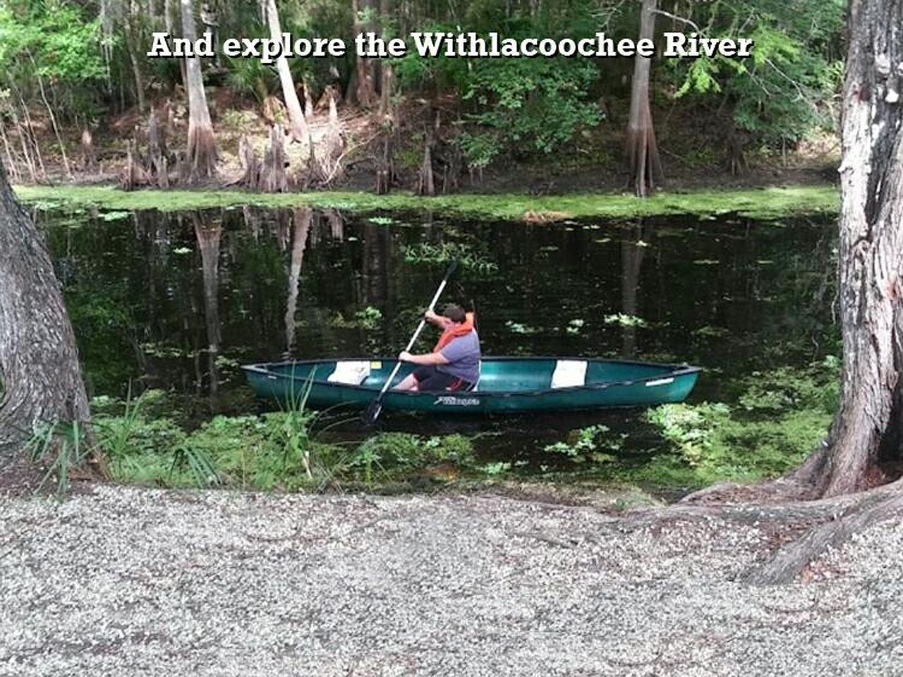a man in a canoe on a river with the words 