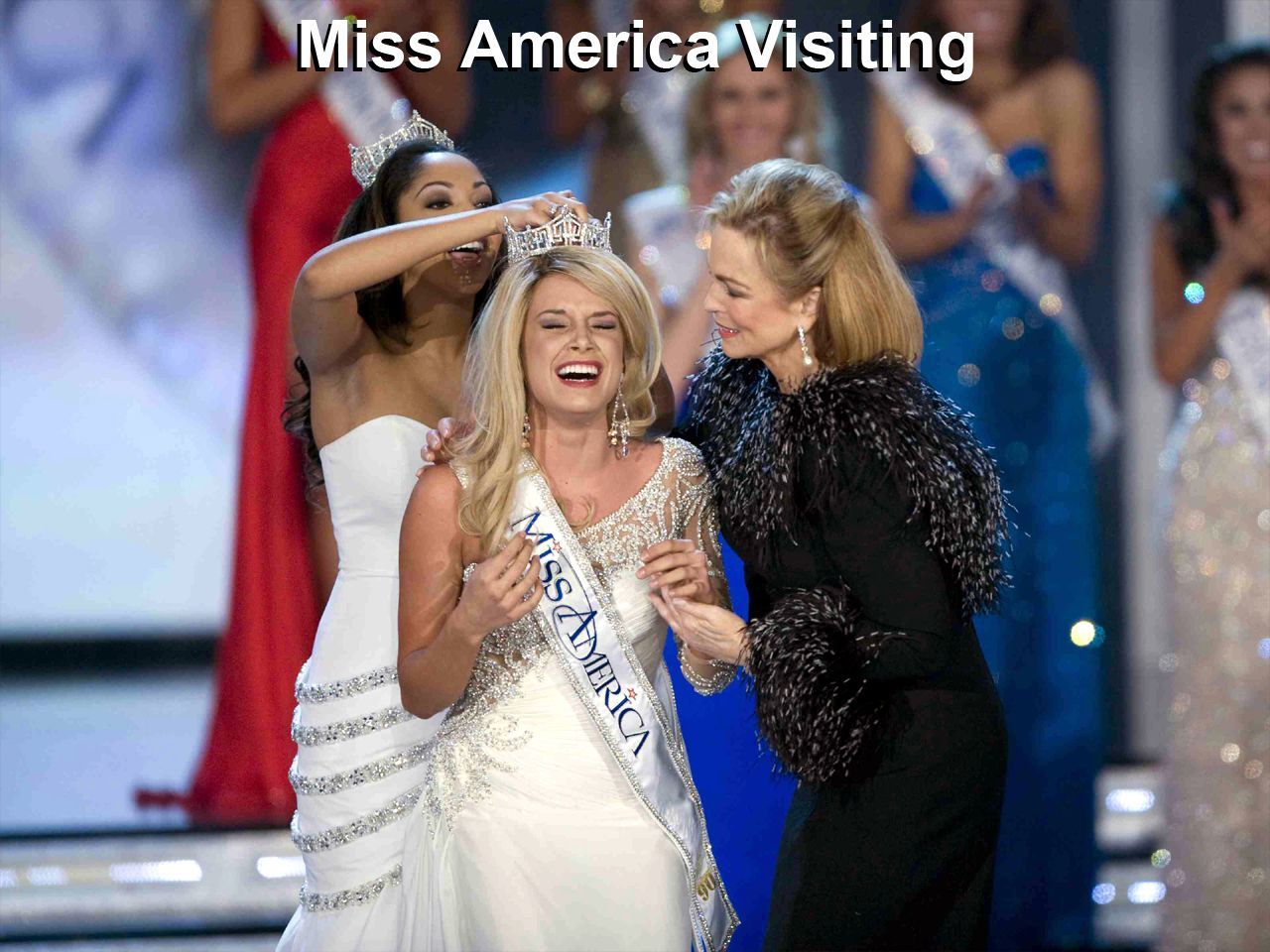 a woman in a miss america sash is being crowned