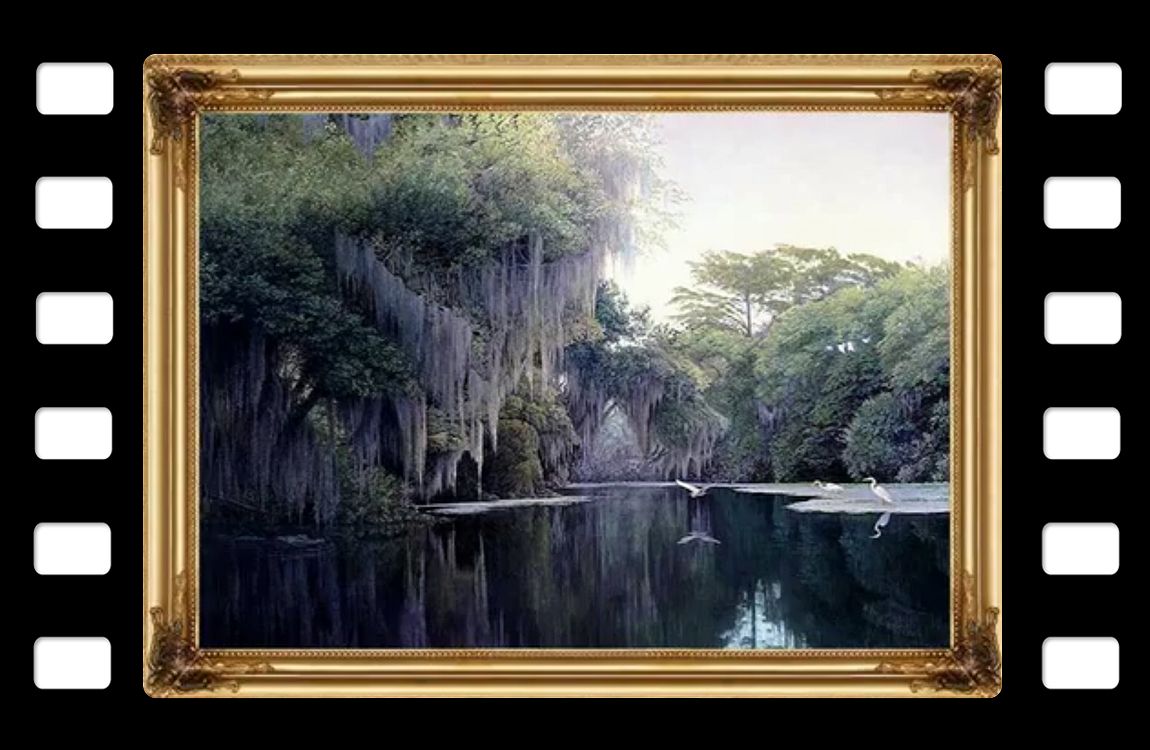 a picture of a river in a frame on a film strip .