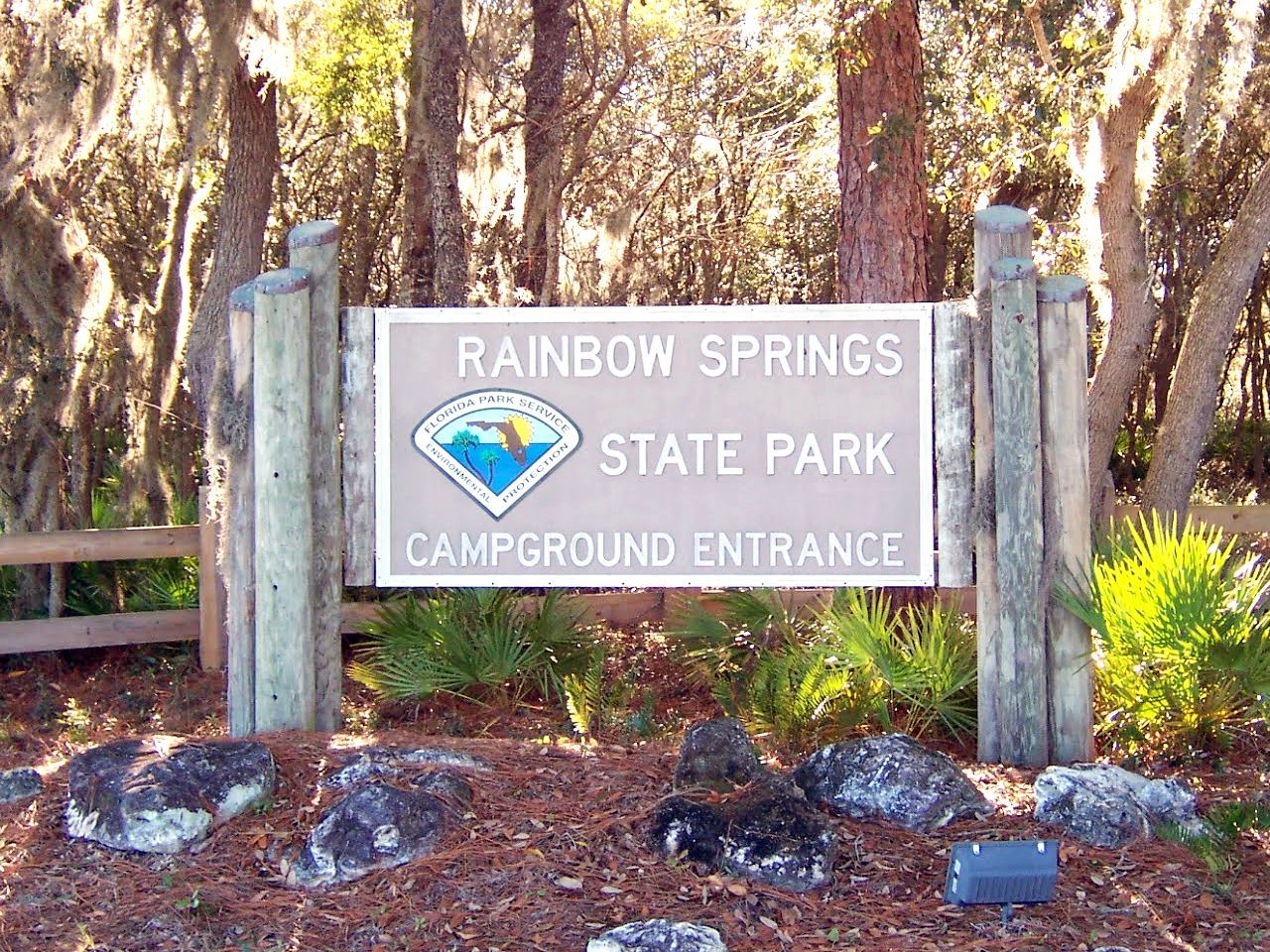 a sign for rainbow springs state park campground entrance