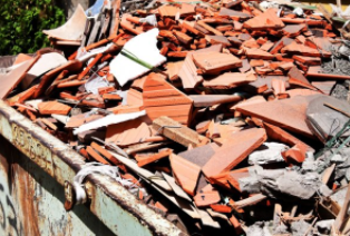 Construction debris for demolition in Cheyenne that needs to be hailed away.