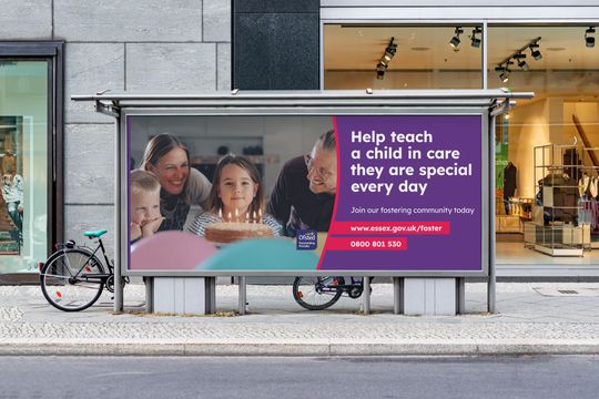 A billboard that says help teach a child in care they are special every day