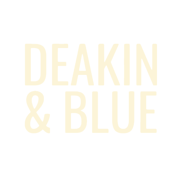 The logo for deakin & blue is yellow on a white background.