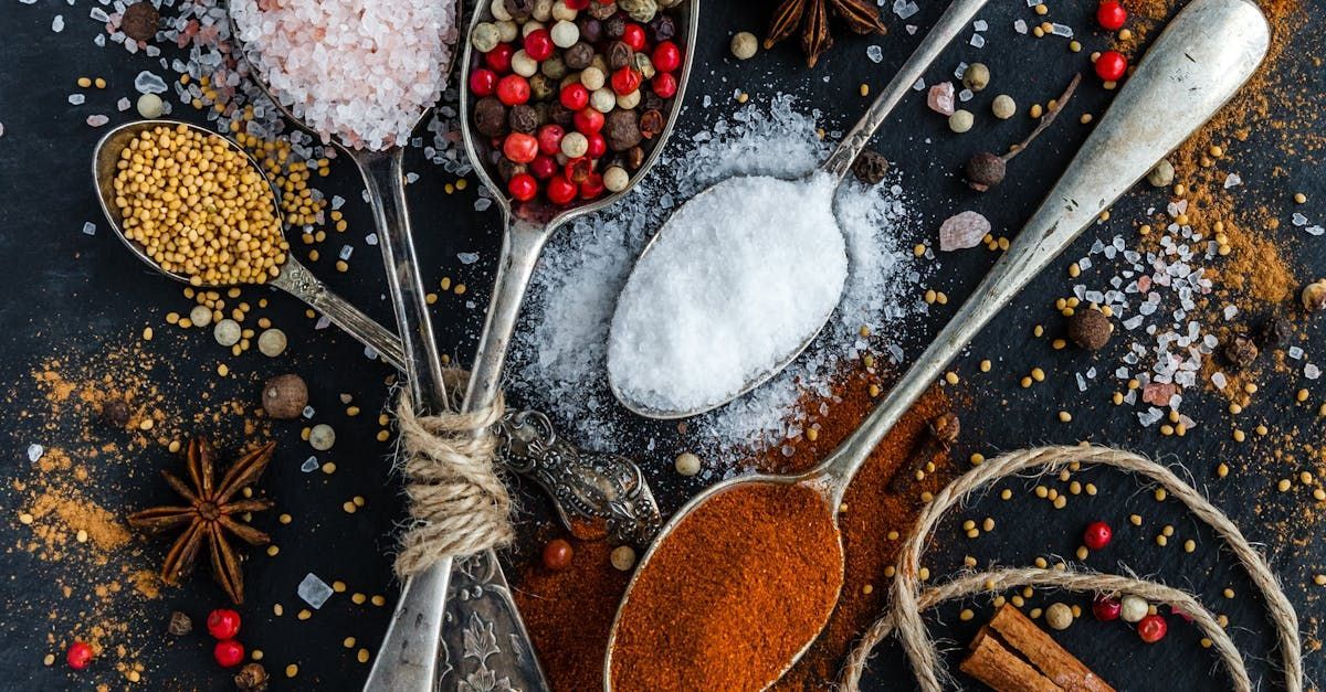 There are many different types of spices in the spoons.