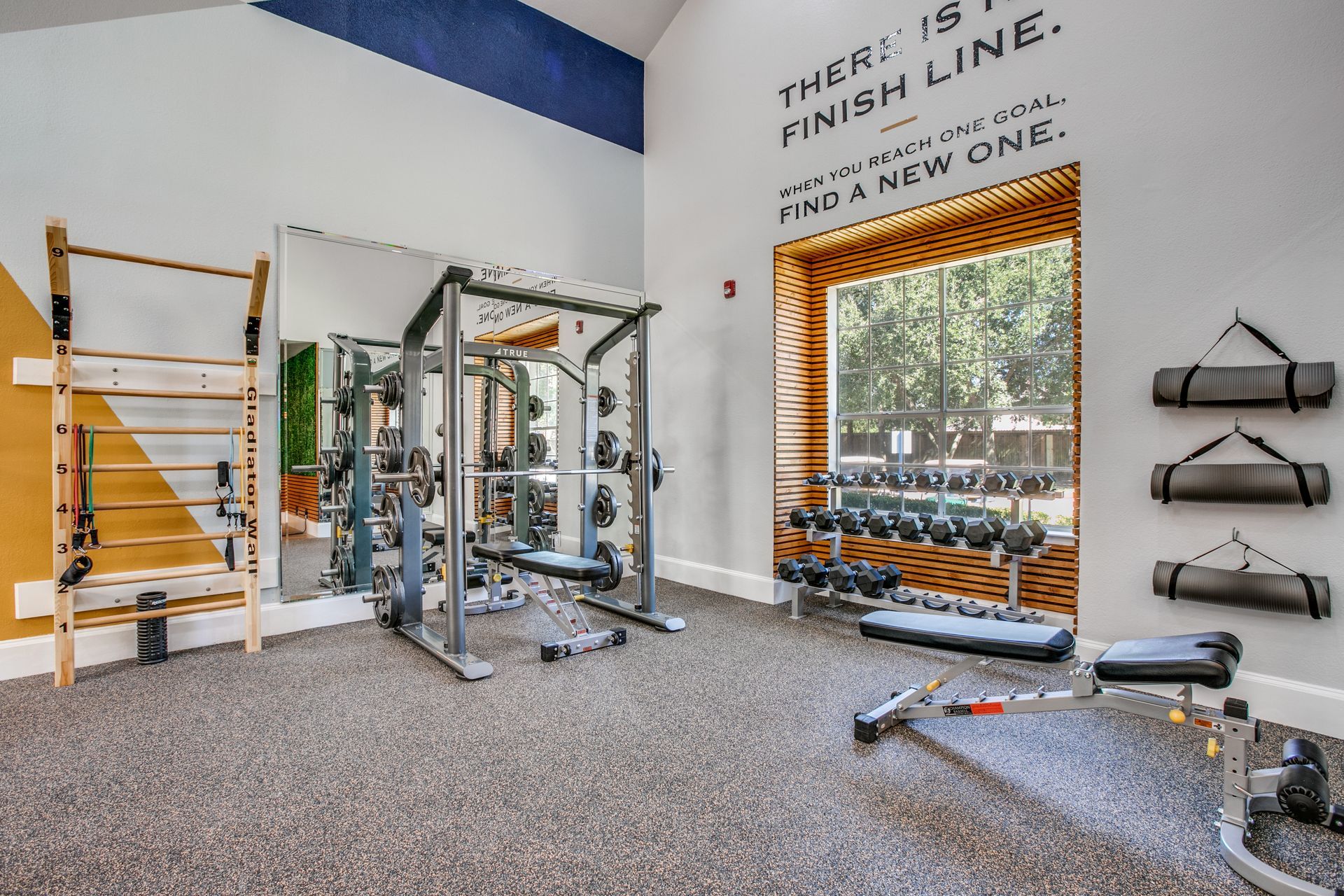 Apartment community fitness center with equipments at Marquis Champions Forest offers apartments near Willowbrook Mall.