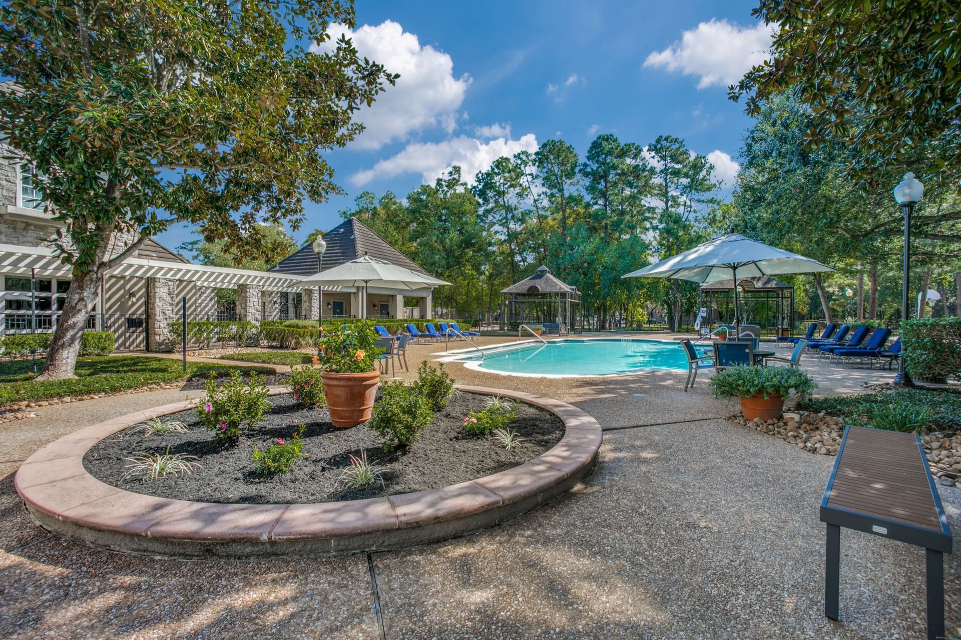 A large swimming pool at Marquis Champions Forest offers apartments for rent near Champions Village.