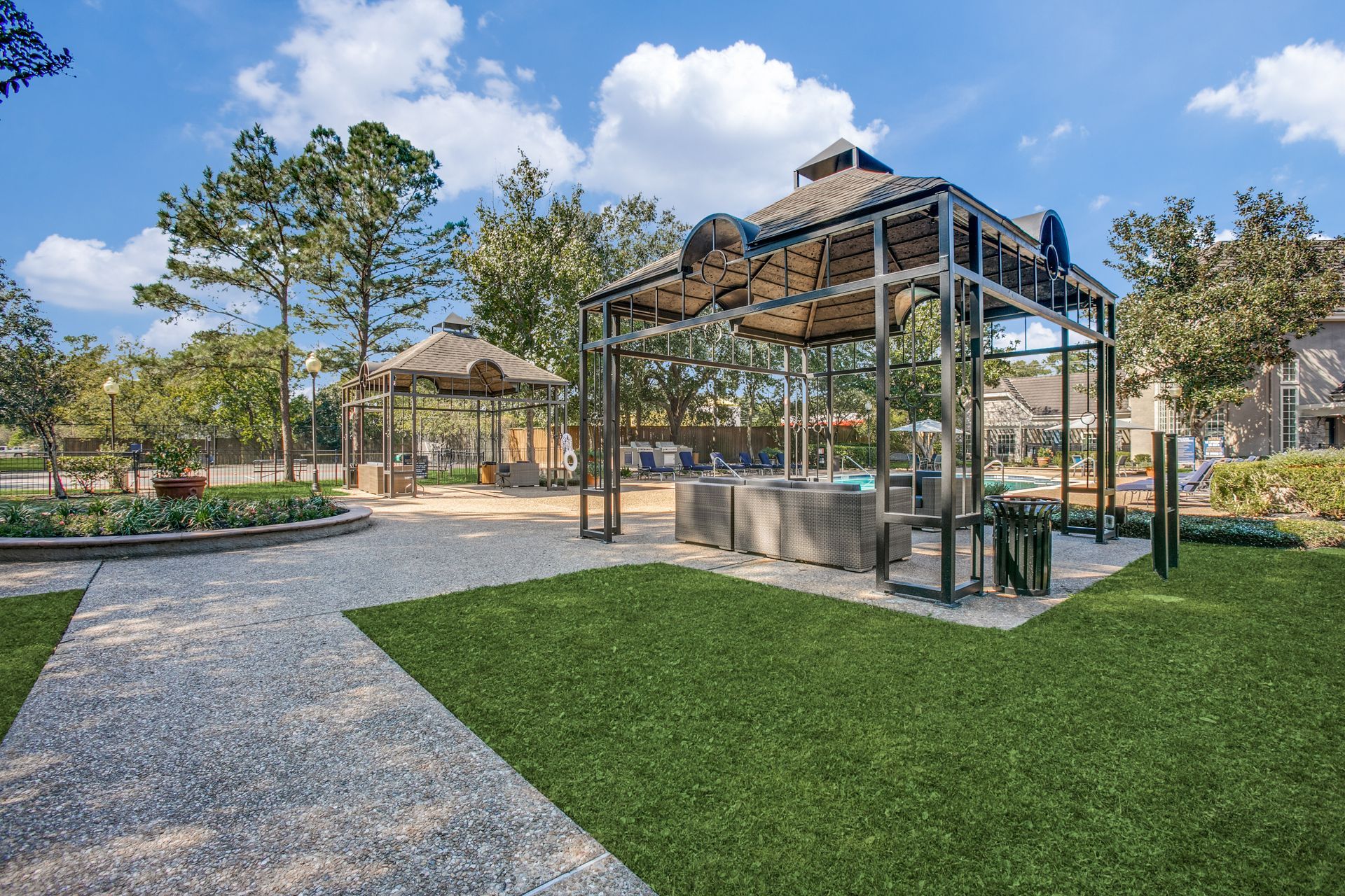 An artist 's impression of a gazebo at Marquis Champions Forest offers pet-friendly apartments in Houston, TX.