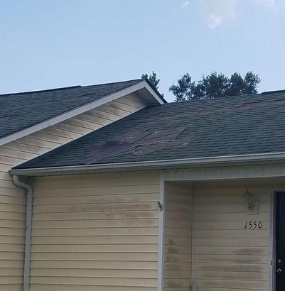 Home with roofing damage