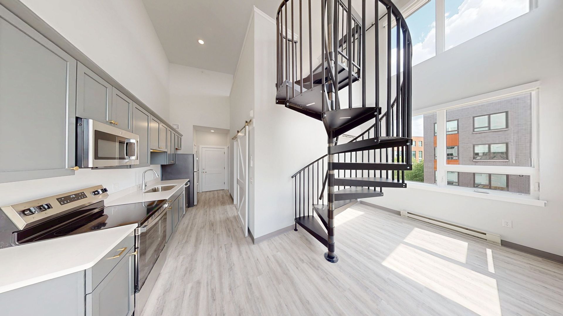 City Sunrise loft with spiral staircase