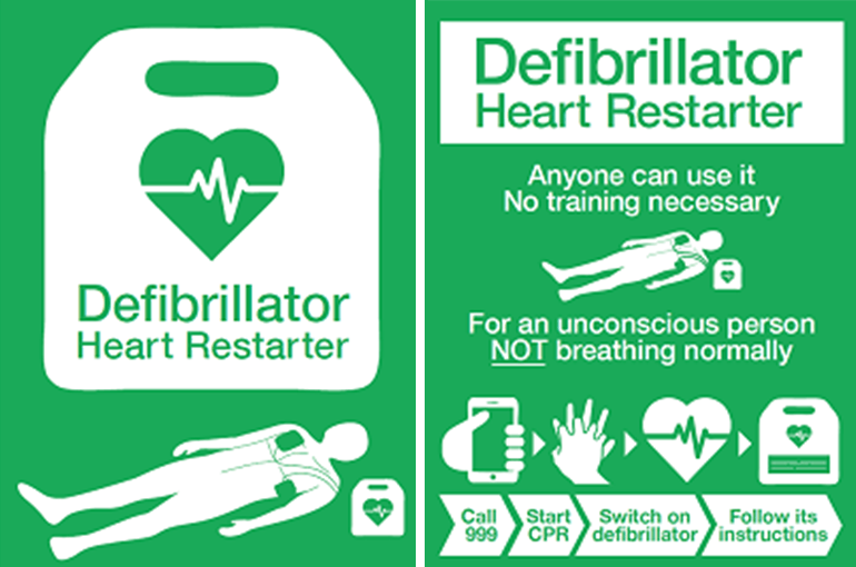 Green sign: Defibrillator instructions. Shows person with defibrillator