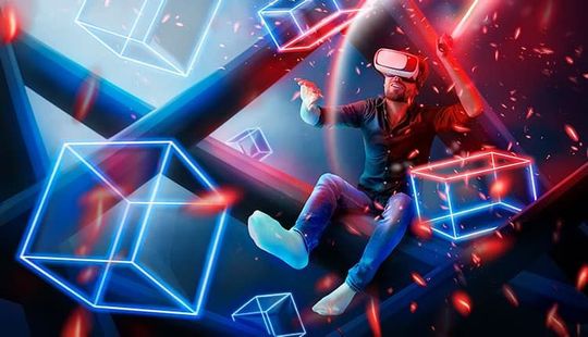 A man wearing a virtual reality headset is flying through the air.