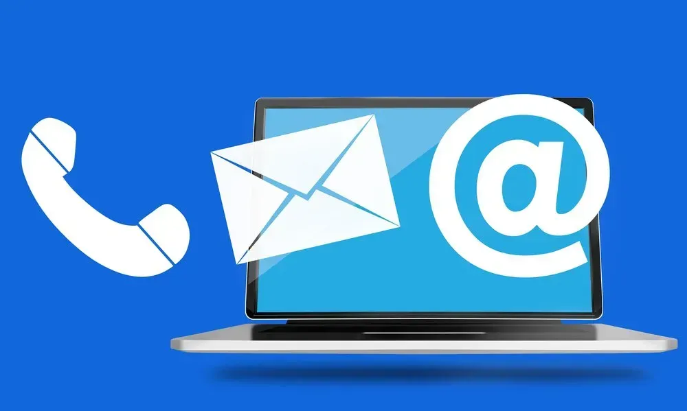 A Laptop With a Phone, Envelope, and Email Icons on It — Orana Glass In Dubbo, NSW