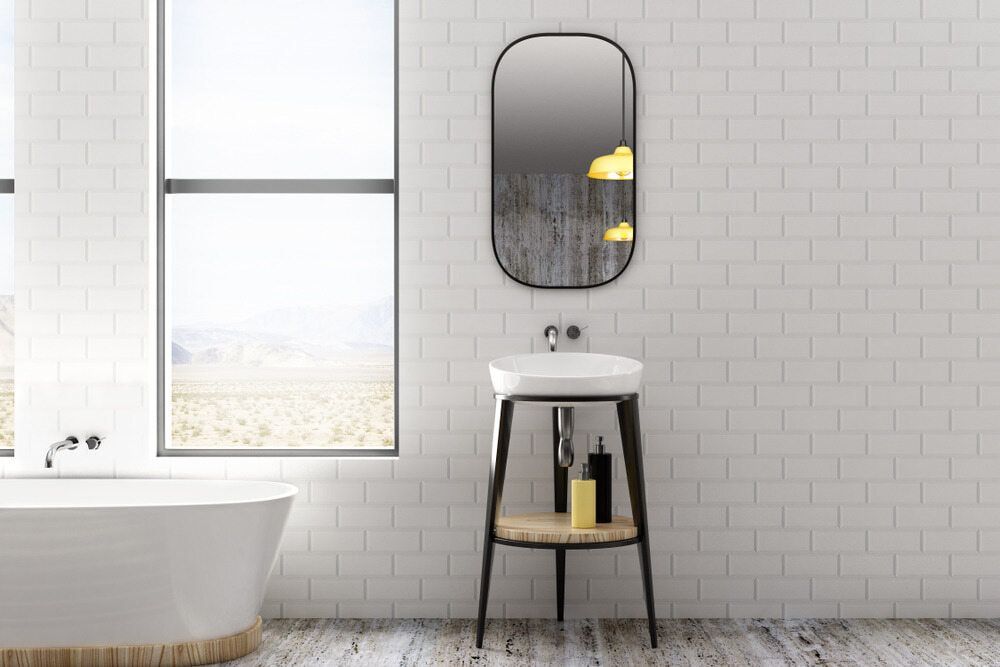A Bathroom With a Tub, Sink, Mirror and Window — Orana Glass In Dubbo, NSW