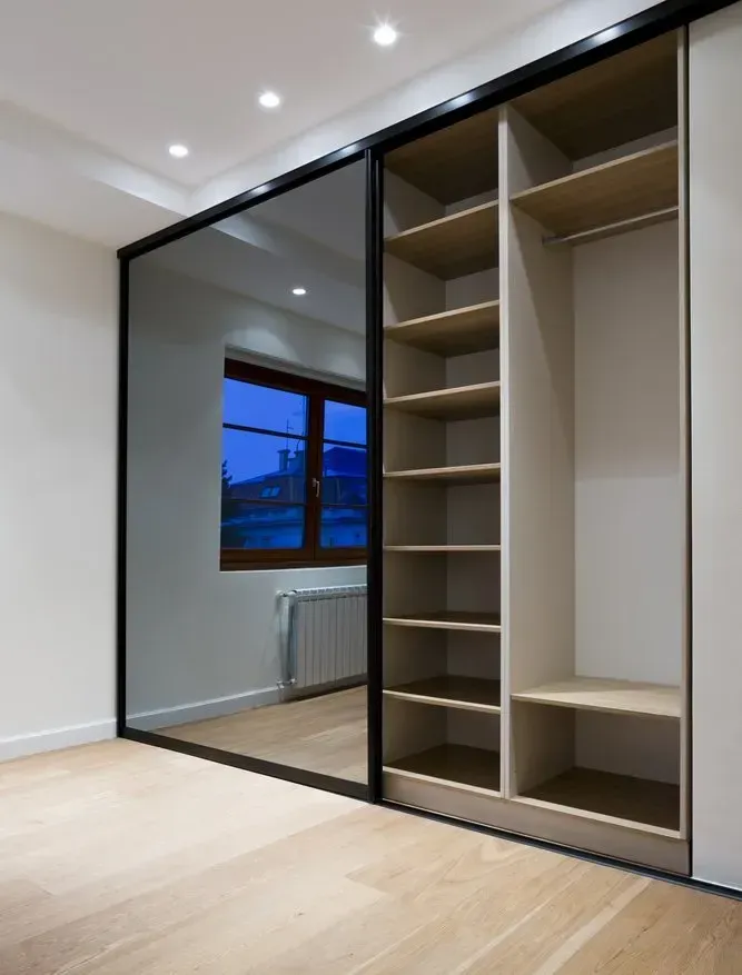 A Room With a Sliding Glass Door and Shelves — Orana Glass In Dubbo, NSW