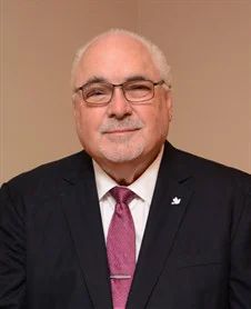 Dr. Michael E. Carlson