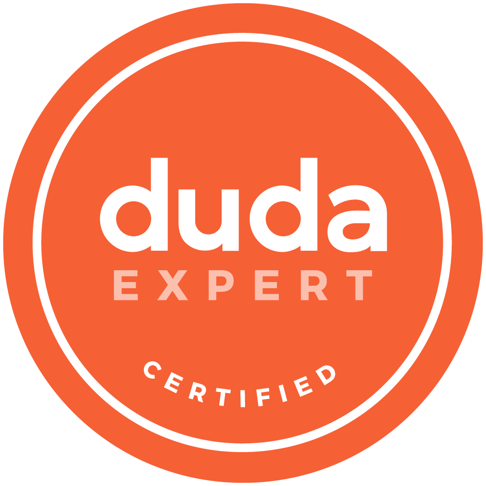 The logo for duda expert is orange and white