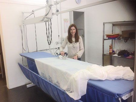 stiratura tende con pressa