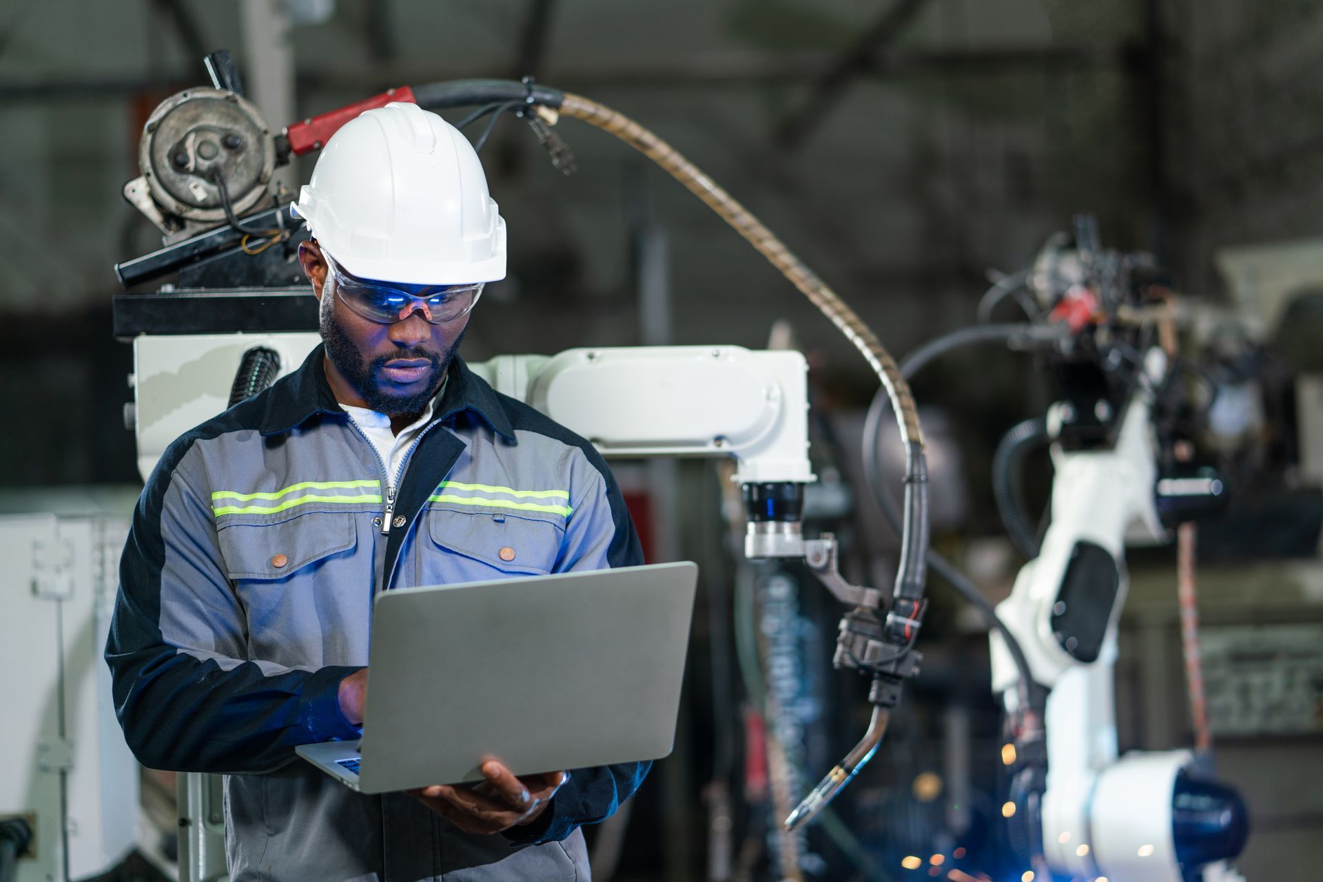 Photos of an industrial factory worker