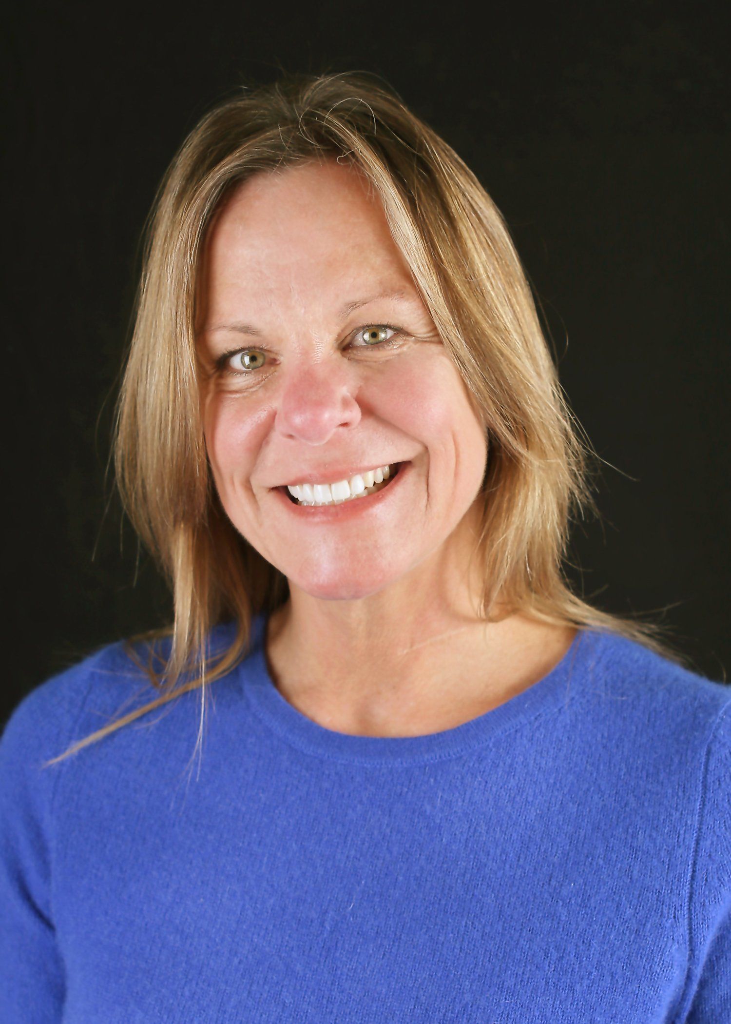 A professional headshot of Dr. Robin Kirby, board-certified pediatrician.