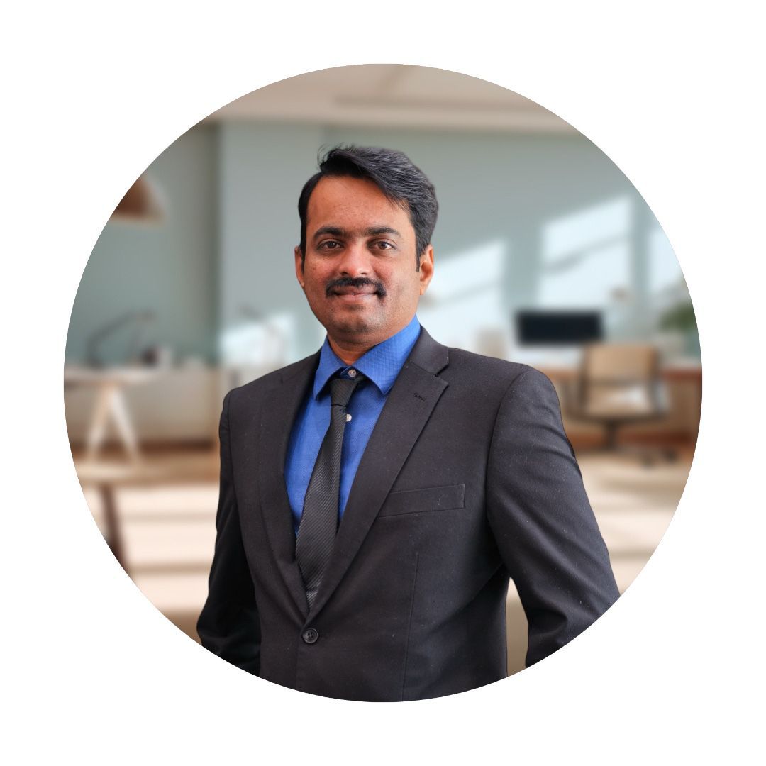 A man in a suit and tie is standing in a circle