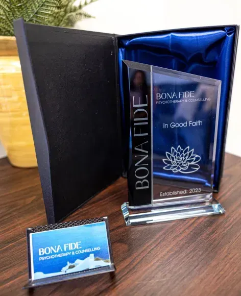 Trophy and business card with