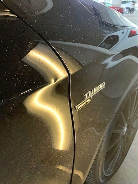 A Black Car with The Word Turbo on The Side — Dent Motive in Nerang, QLD