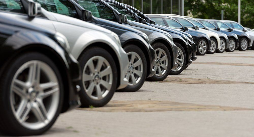 A Row of cars are Parked in a Parking lot — Dent Motive in Nerang, QLD