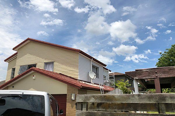 yellow and red house