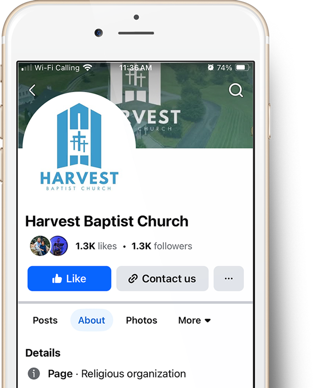 A smart phone with the facebook page of harvest baptist church on it.