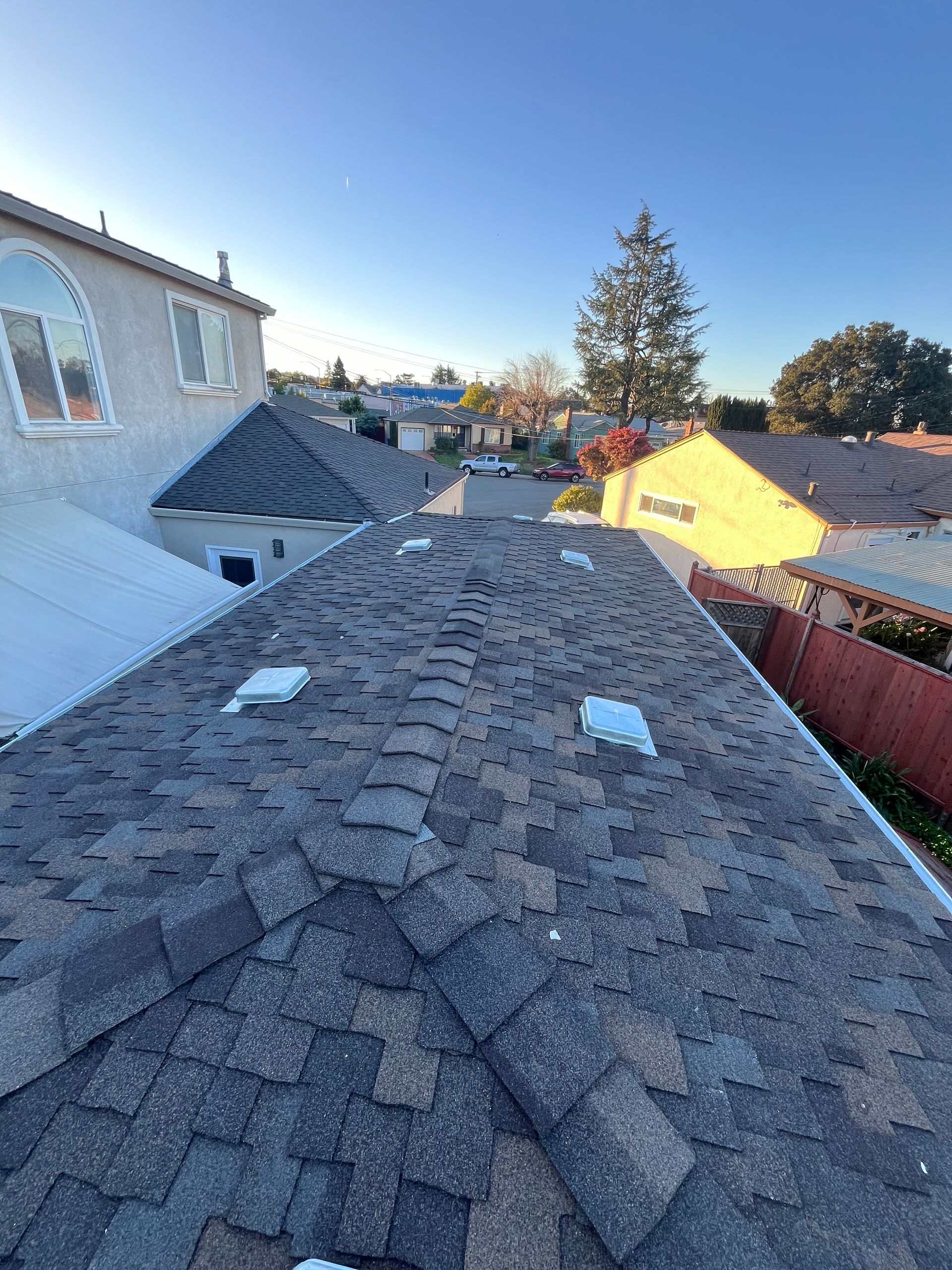 A roof of a house with a lot of shingles on it.