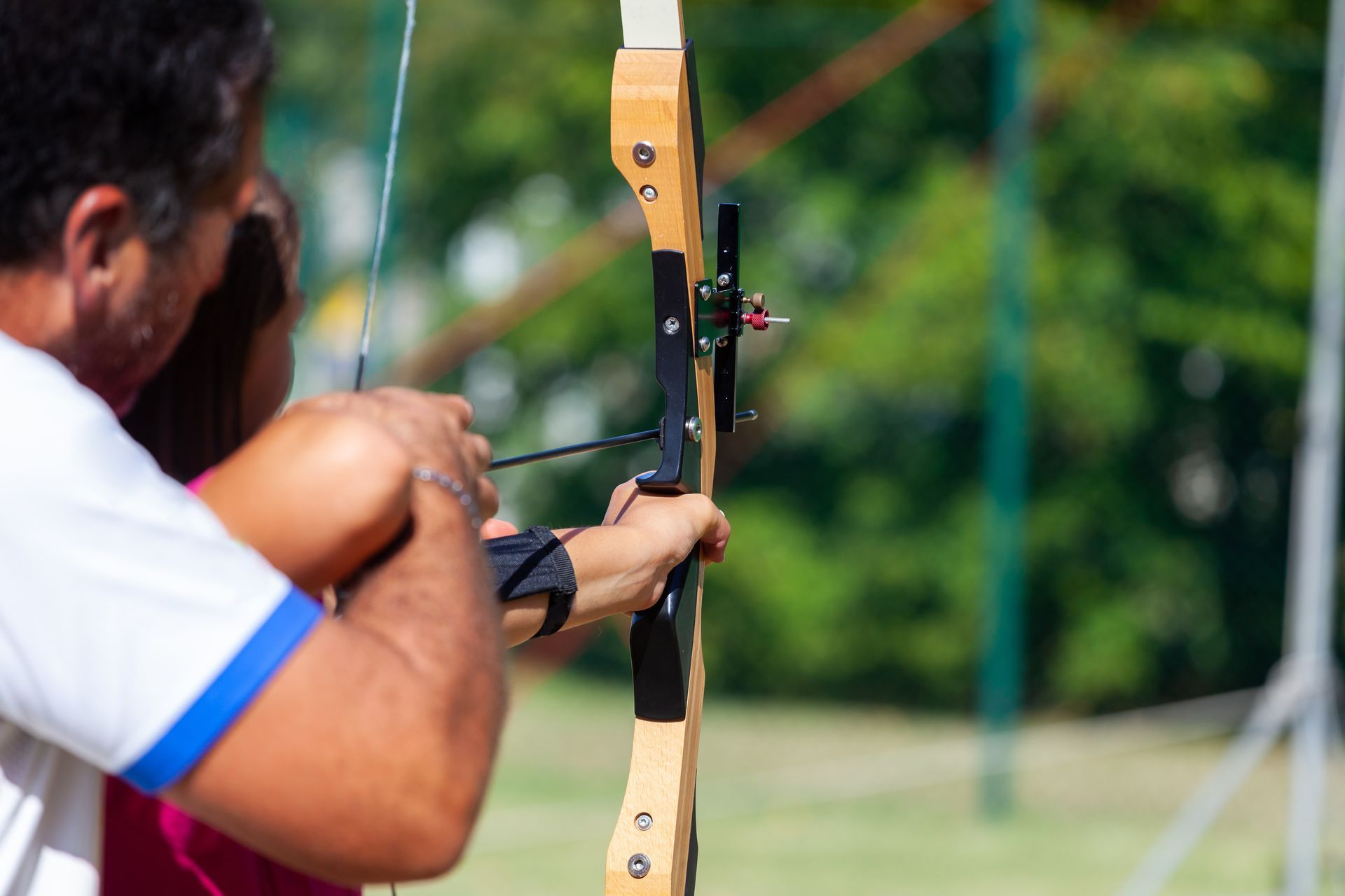 Man shooting bow