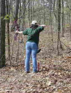 Leigh Morrisett shooting Bow