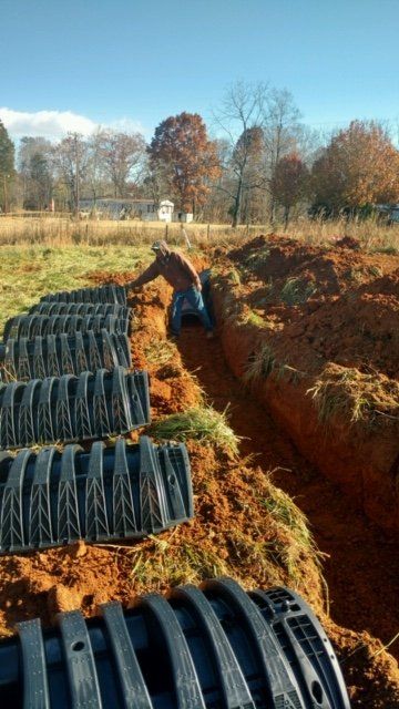 A septic replacement service in progress in Greensboro, NC