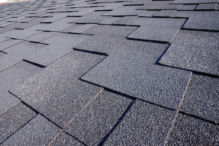 A close up of a roof with shingles on it