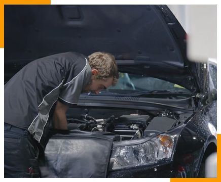 Man In Blue Smiling in Chris Colgrave Automotive Company Vehicle Maintenance in Launceston