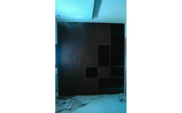 Parete attrezzata in corten