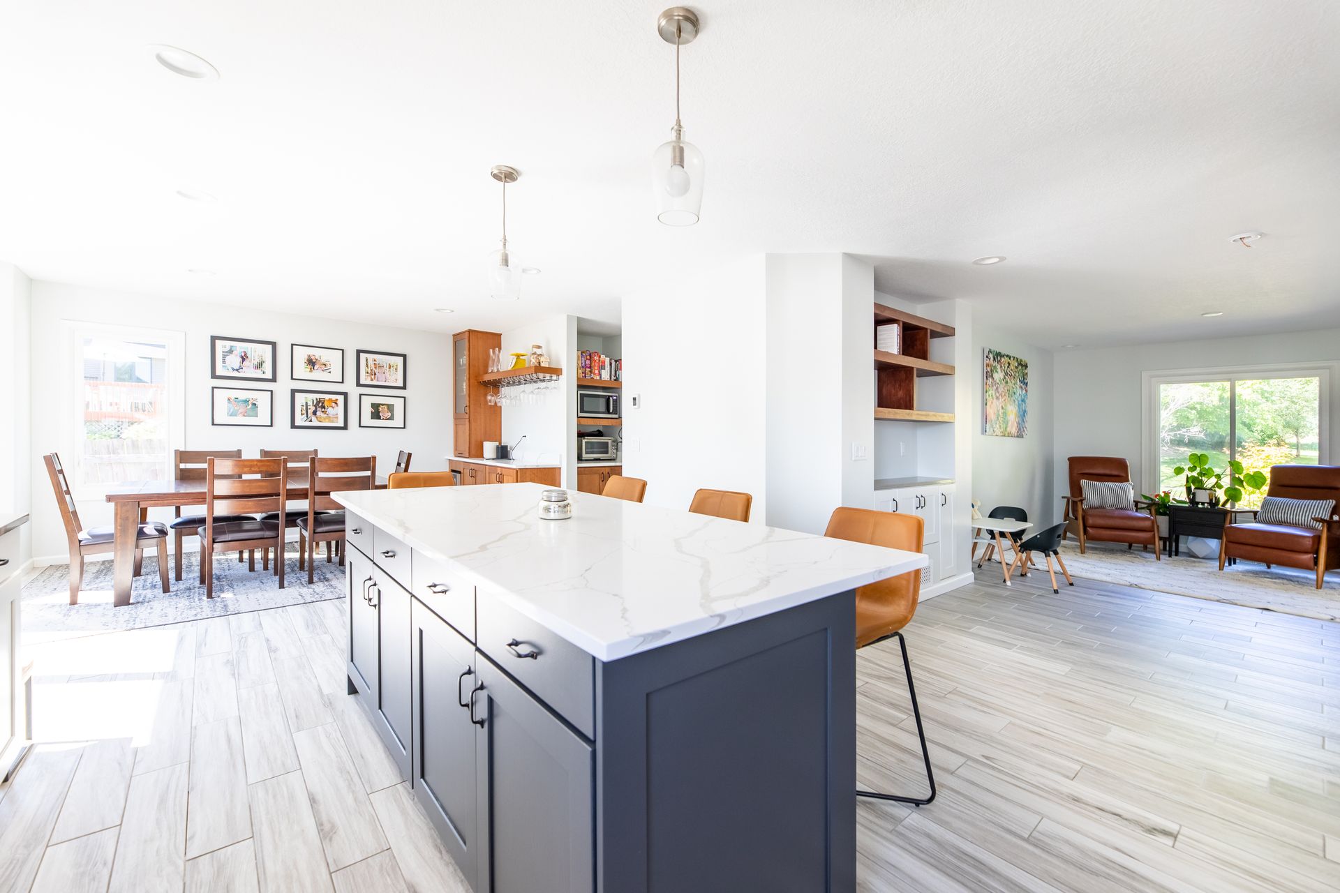 A kitchen with a large island in the middle of the room.