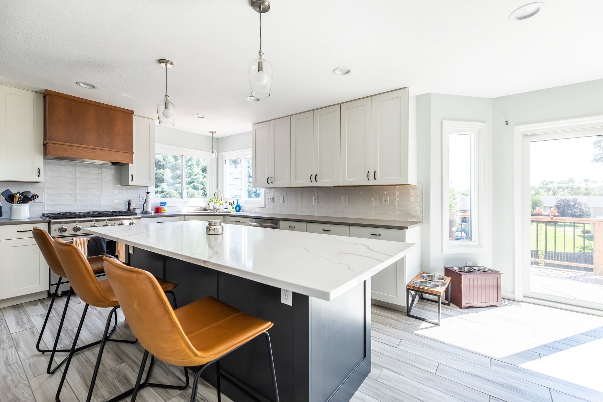 There is a large island in the middle of the kitchen.