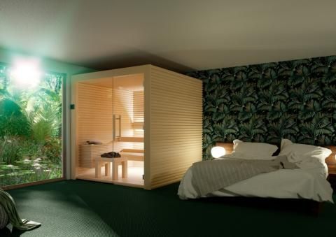 A bedroom with a bed and a indoor luxury sauna in the corner.