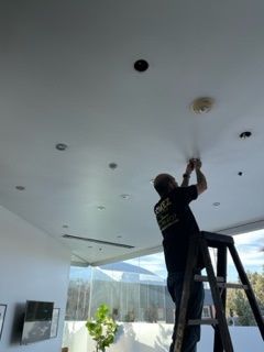 Man Working on the Ceiling - Los Angeles, CA - Gomez Electric Inc
