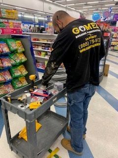 Men in Store - Los Angeles, CA - Gomez Electric Inc