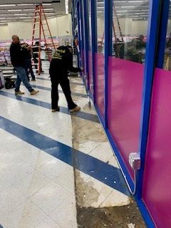 Man Painting a Wall in a Store - Los Angeles, CA - Gomez Electric Inc