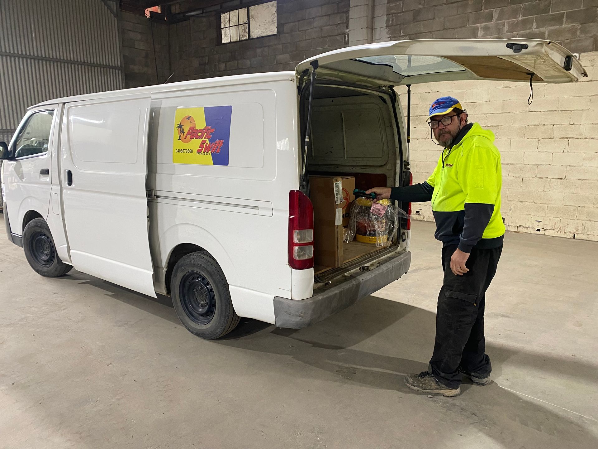 Man Checking Cargoes — Professional Transport in Taree South NSW