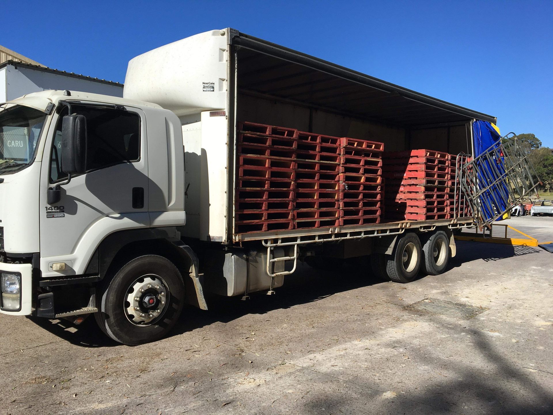 Large Truck With Pallets Inside — Professional Transport in Taree, NSW