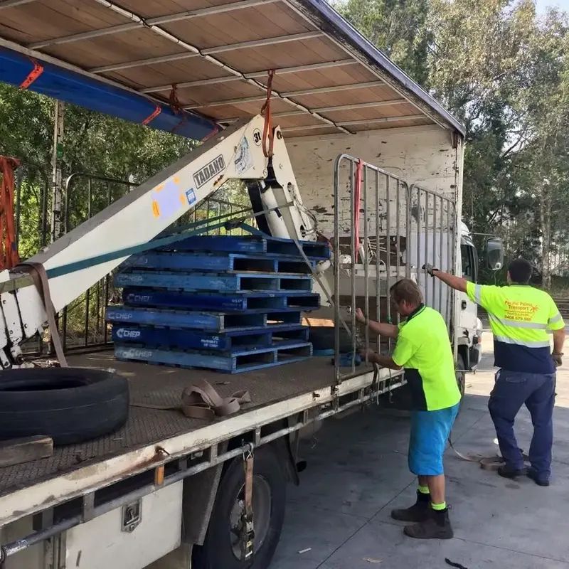 Men Preparing Transport Truck — Professional Transport in Forster, NSW