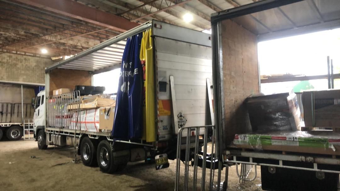 Trucks Transporting Goods — Professional Transport in Taree South NSW