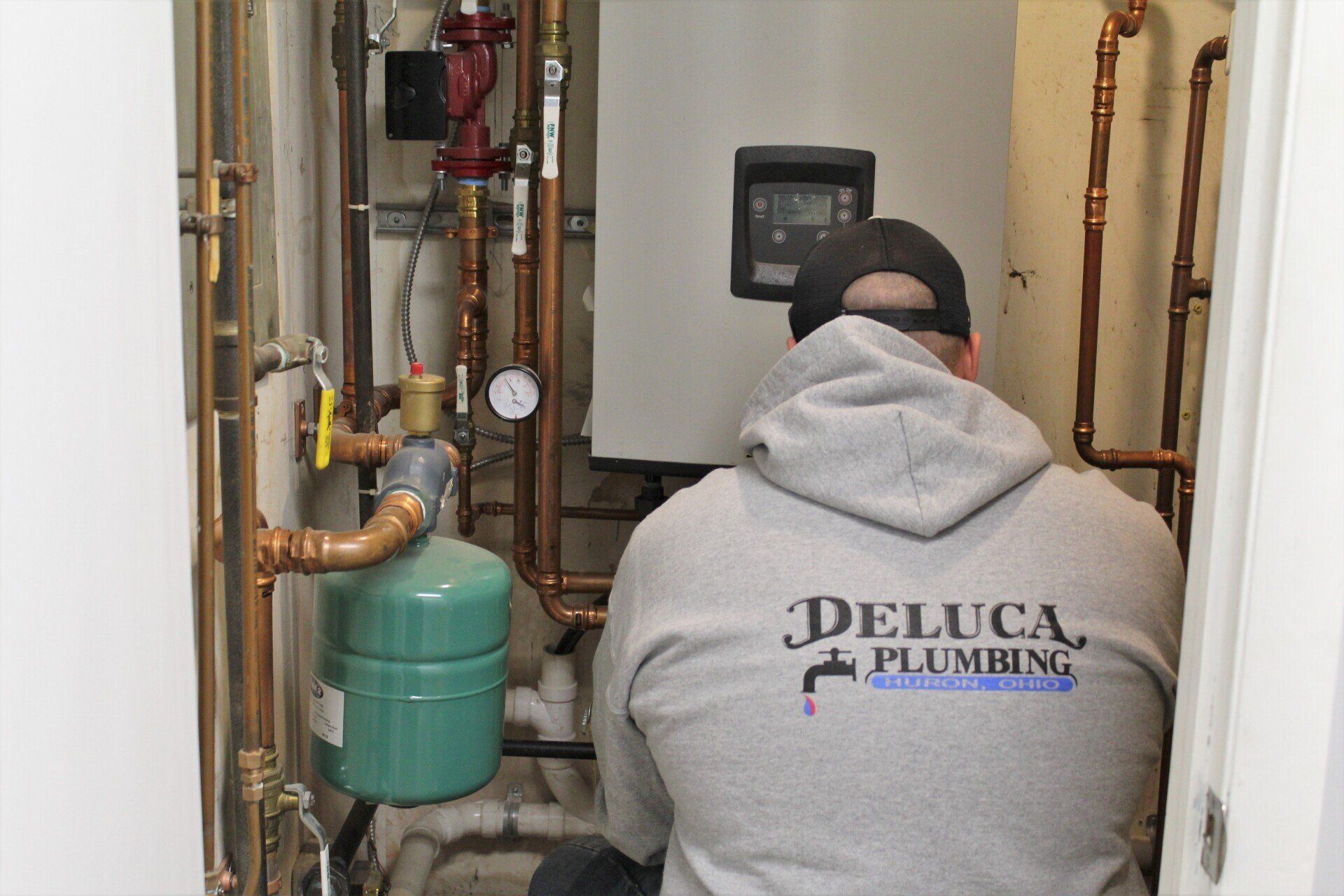 Two Cars — Huron, OH — DeLuca Plumbing