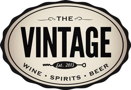 Logo for The Vintage, a wine, spirits, and beer bar established in 2013, with an oval design.